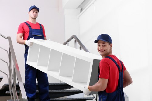 Man With Van Edmonton worker sorting recyclable moving materials