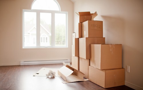 Moving team handling boxes safely for Man With Van Edmonton