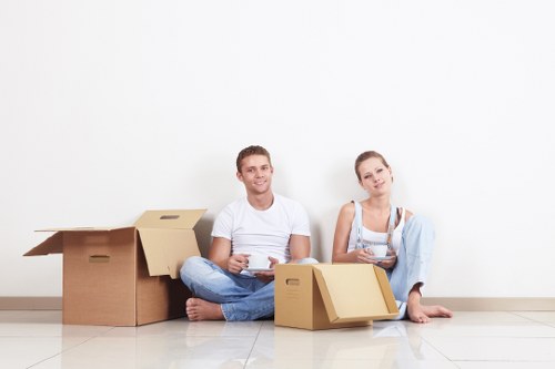 Edmonton house removalists unloading furniture and boxes at a new home