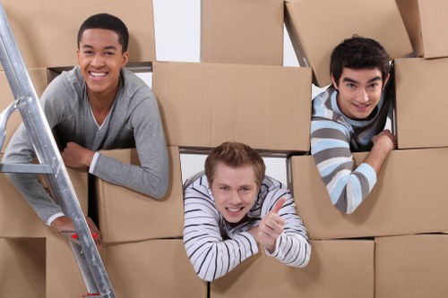 Professional movers setting up a business space after relocation