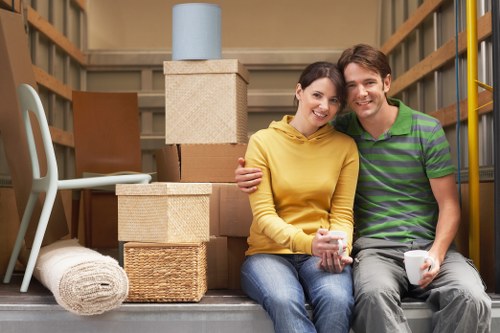 Packed boxes and furniture ready for local home relocation