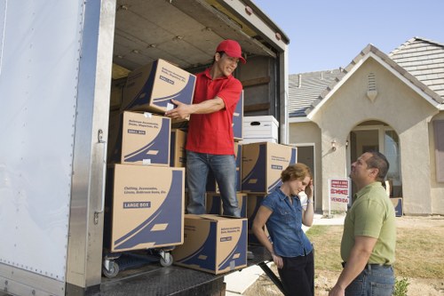Professional movers handling stairs during an Edmonton move