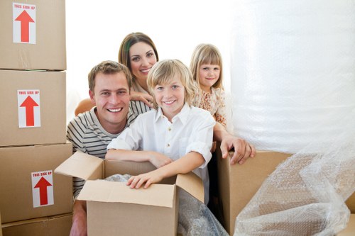 Moving team organizing boxes in an Edmonton condo building