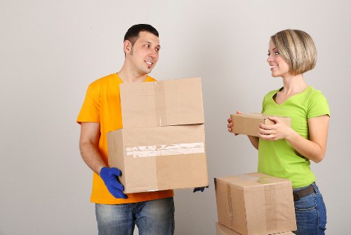 Local Edmonton movers working at a home entrance