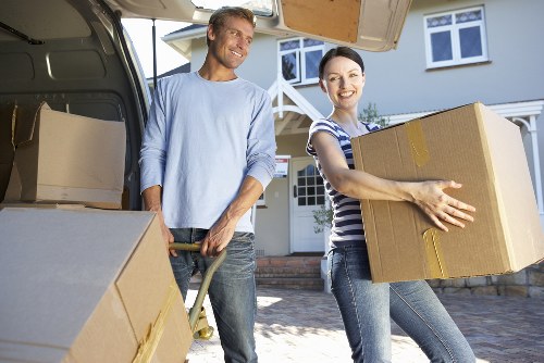 Loading boxes and furniture into a van for an Edmonton move