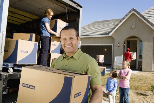 Packed household boxes and furniture ready for a local Edmonton move